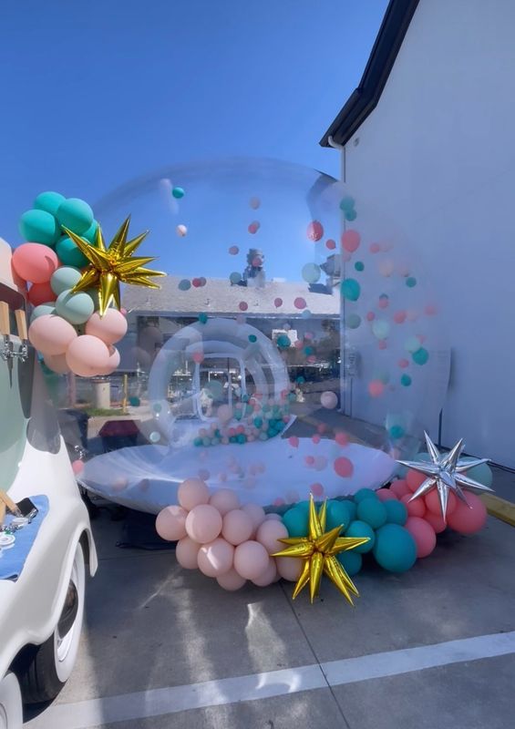 Bubble House with Balloon Garland and Attendant