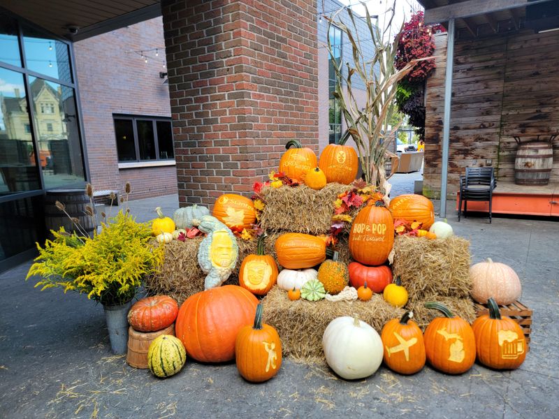 Carved Pumpkin Photo Op Display with Straw Bales