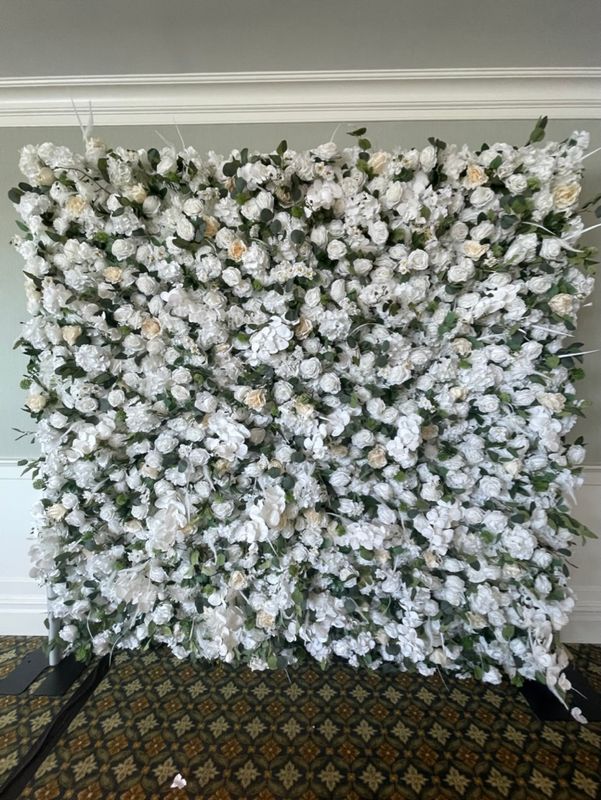 White Floral Wall w/ booking